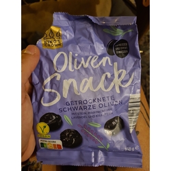 Oliven Snack getrocknete schwarze Oliven mit Stein, mariniert mit Lavendel und Kräutern